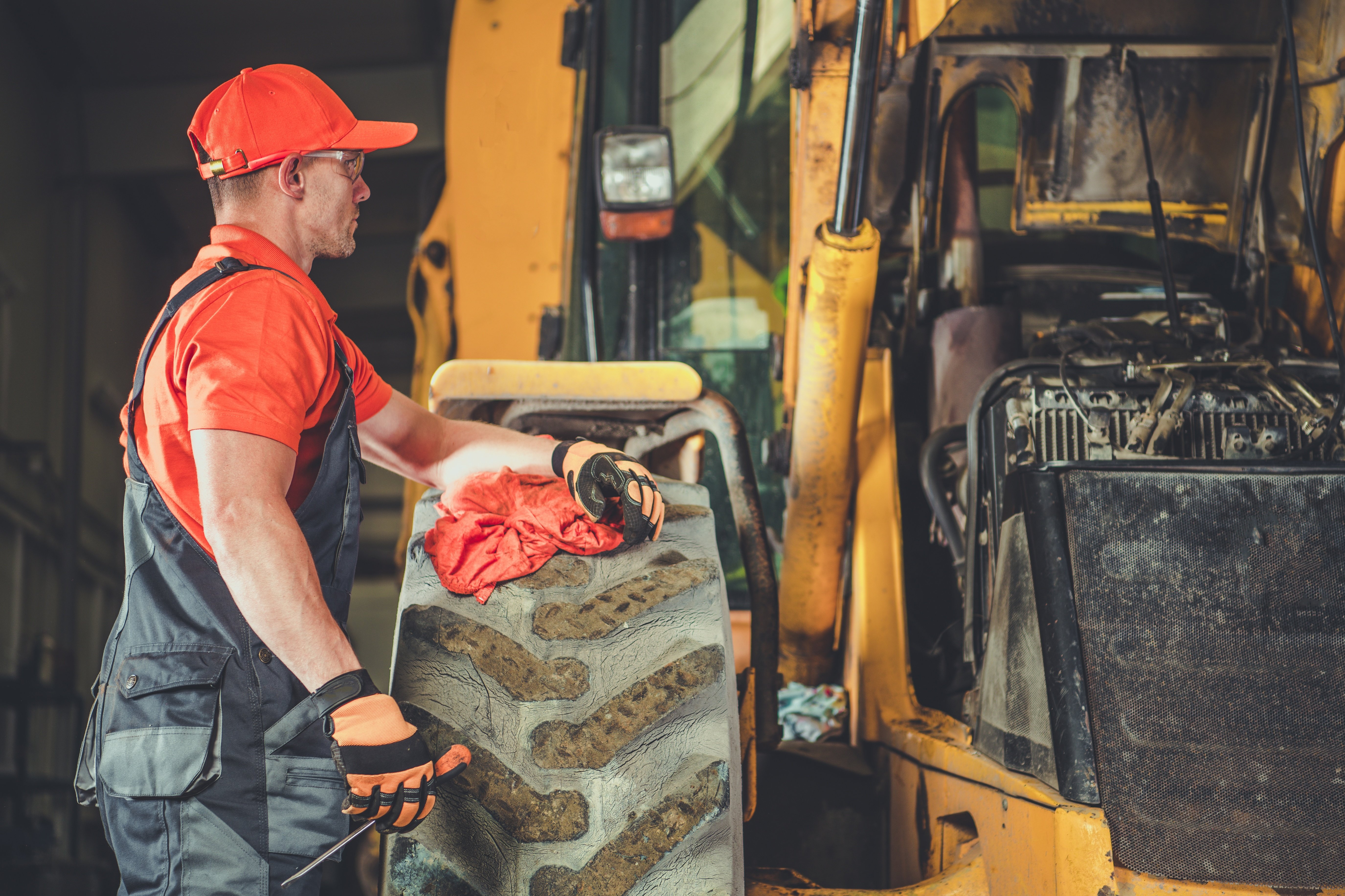 GHT Parts technician servicing earthmoving machinery